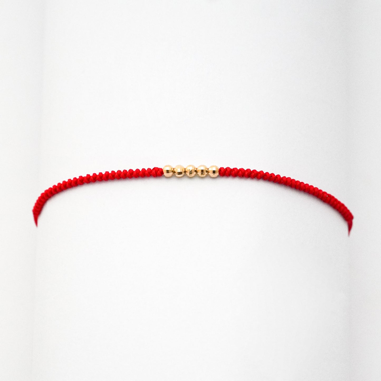 Pulsera tejida red line con bolitas diamantadas 2.5 mm en Oro18k