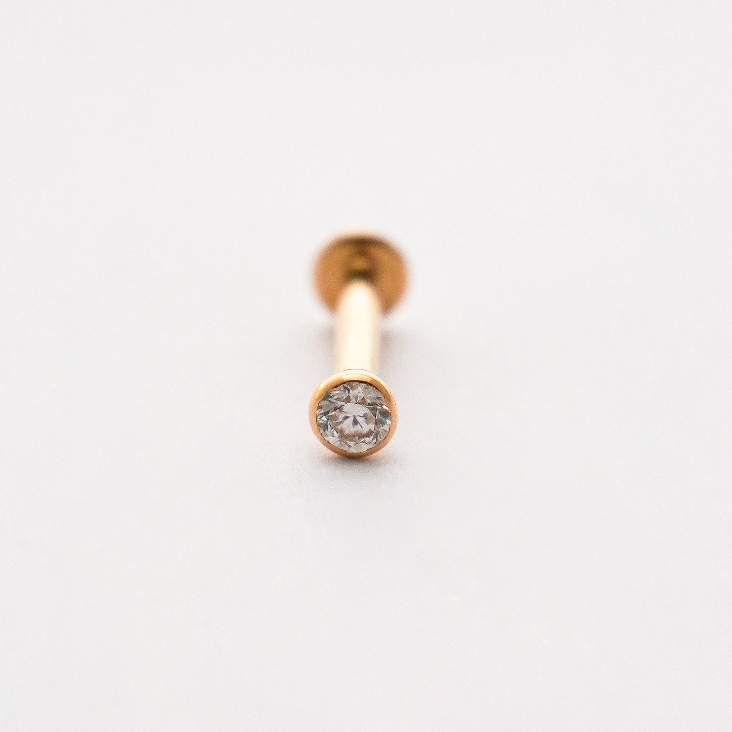 Piercing punto de luz bicelado en Oro18k amarillo con diamante natural