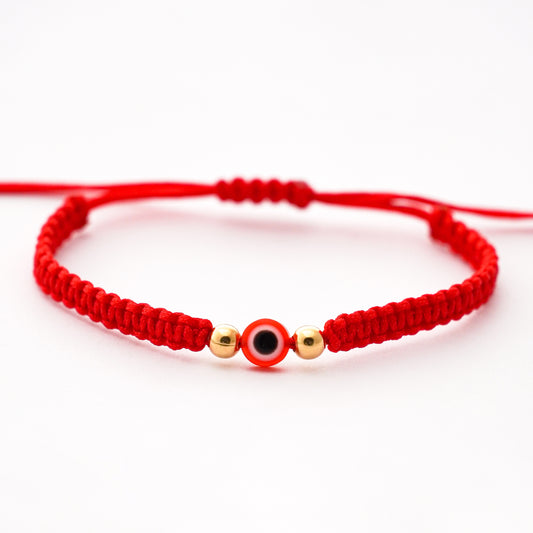 Pulsera tejida protectora con ojo turco y 2 bolitas 4 mm en Oro18k