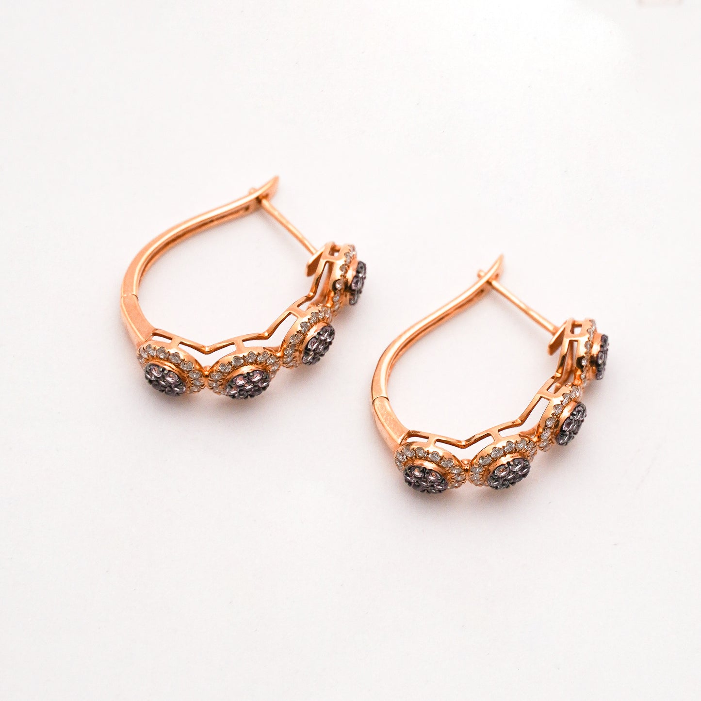 Argollas con zafiros y diamantes naturales en Oro18k naranja