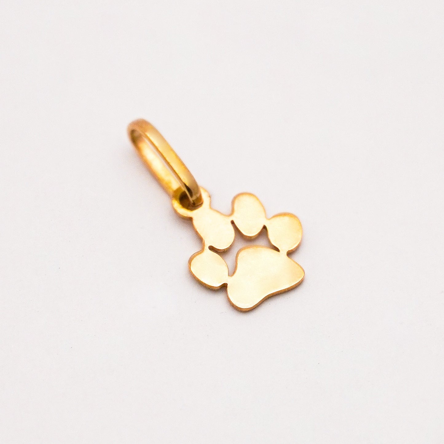 Dije Huellita mini Oro18k