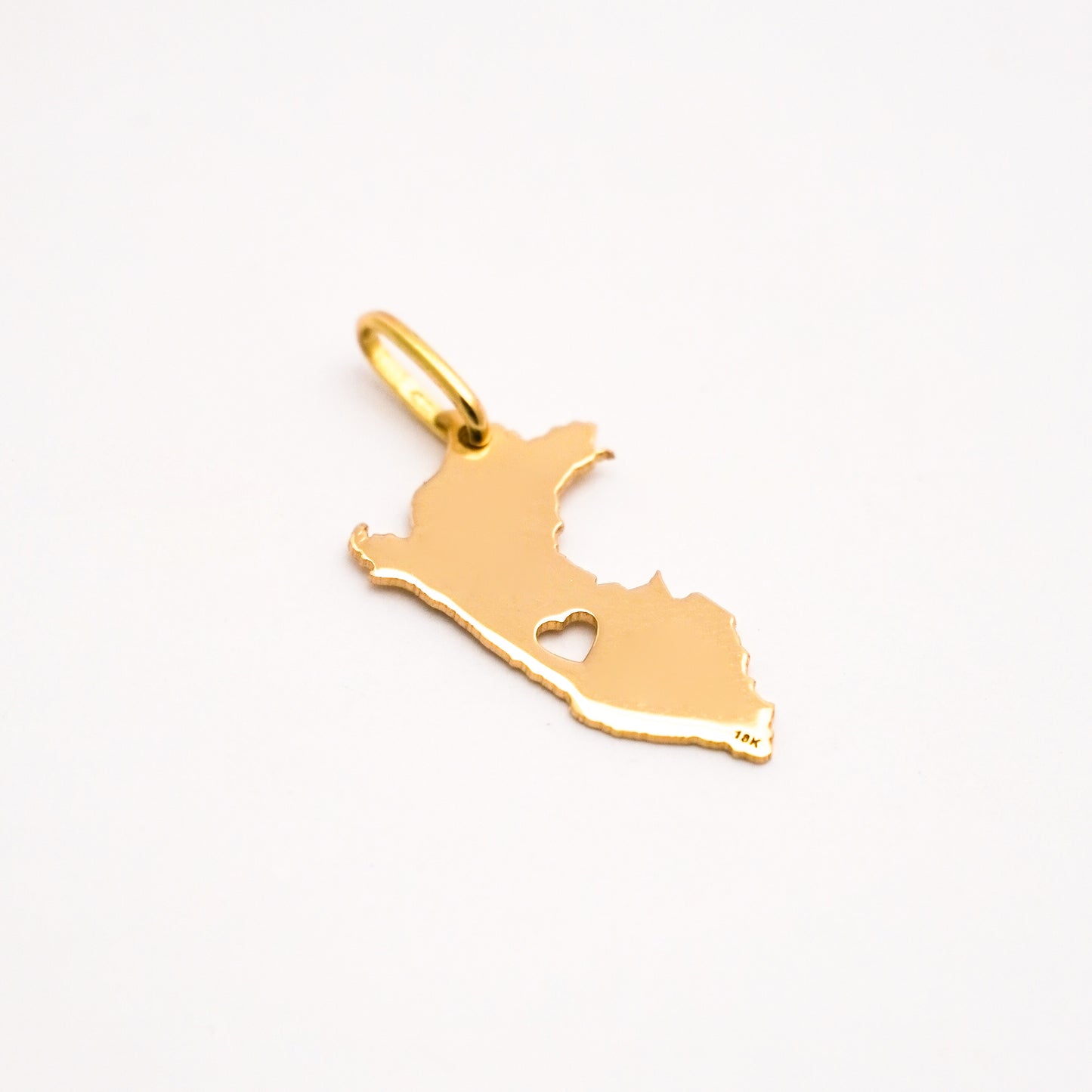 Dije mapa de perú corazón Oro18k