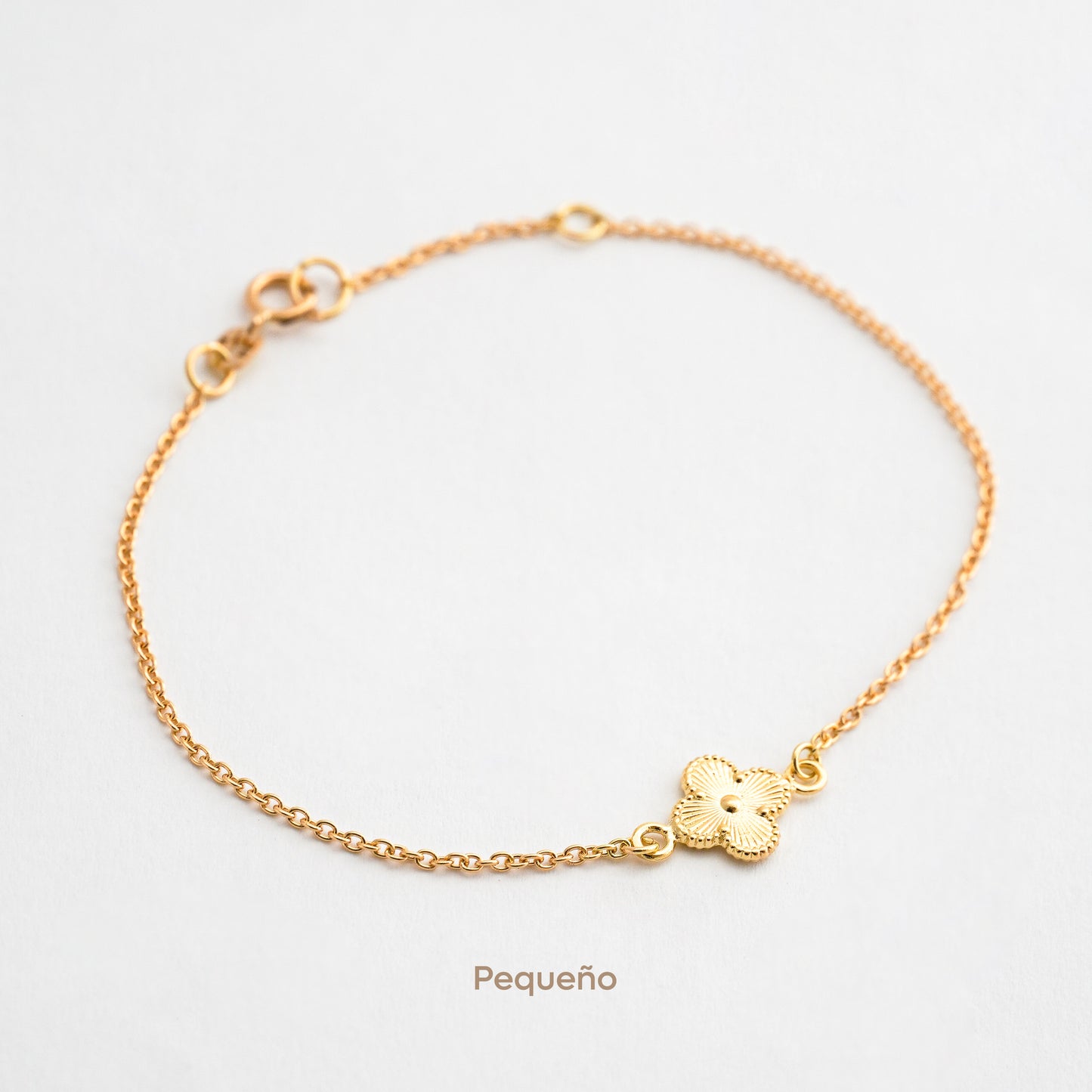 Pulsera trebol solitario en Oro18k
