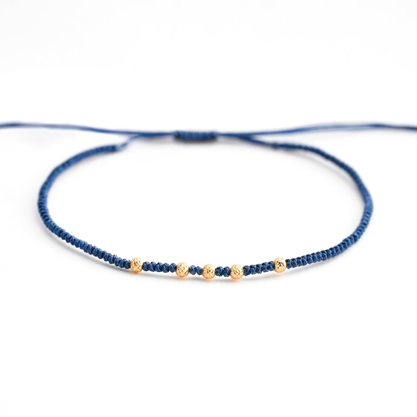 Pulsera blue line con bolitas diamantadas 2.5 mm en Oro18k