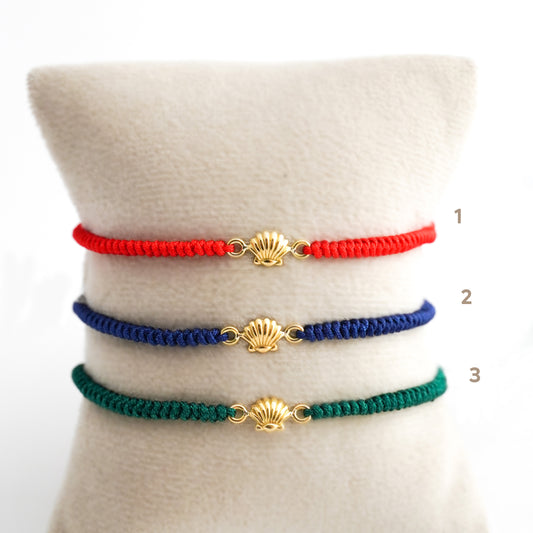 Pulsera tejida conchita de mar en Oro18k
