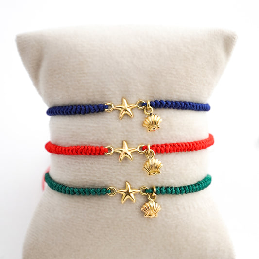 Pulsera tejida estrellita y conchita de mar en Oro18k