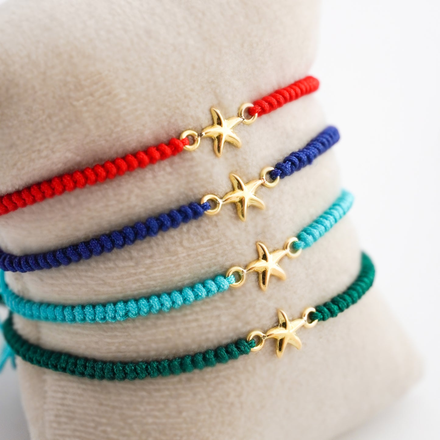 Pulsera tejida estrellita de mar en Oro18k