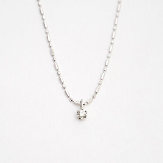 Cadena punto y coma con mini charm diamante natural 0.05 cts en Oro 18k blanco