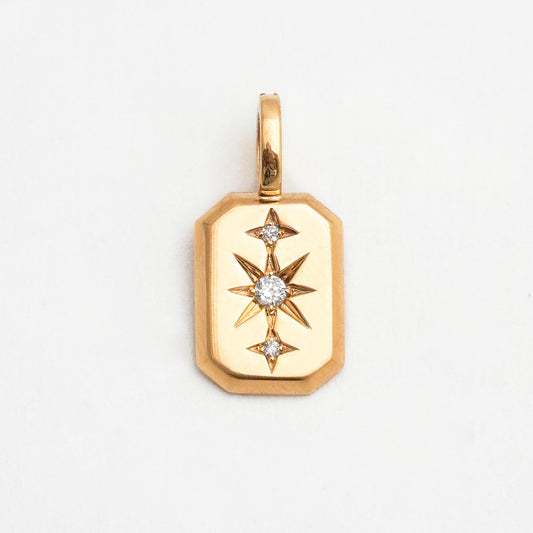 Dije Charm Polaris estrella con Diamante natural en Oro 18k