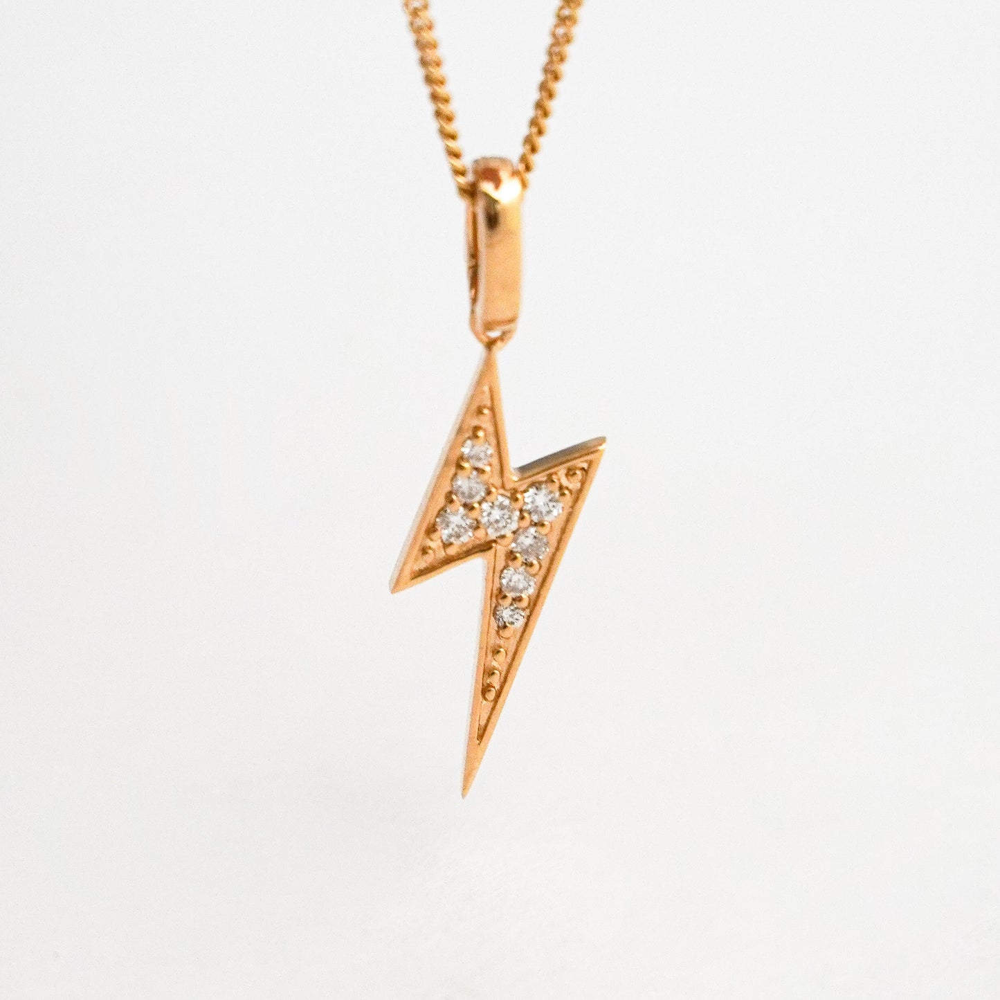 Dije Charm Rayo Diamantes Naturales Oro 18K