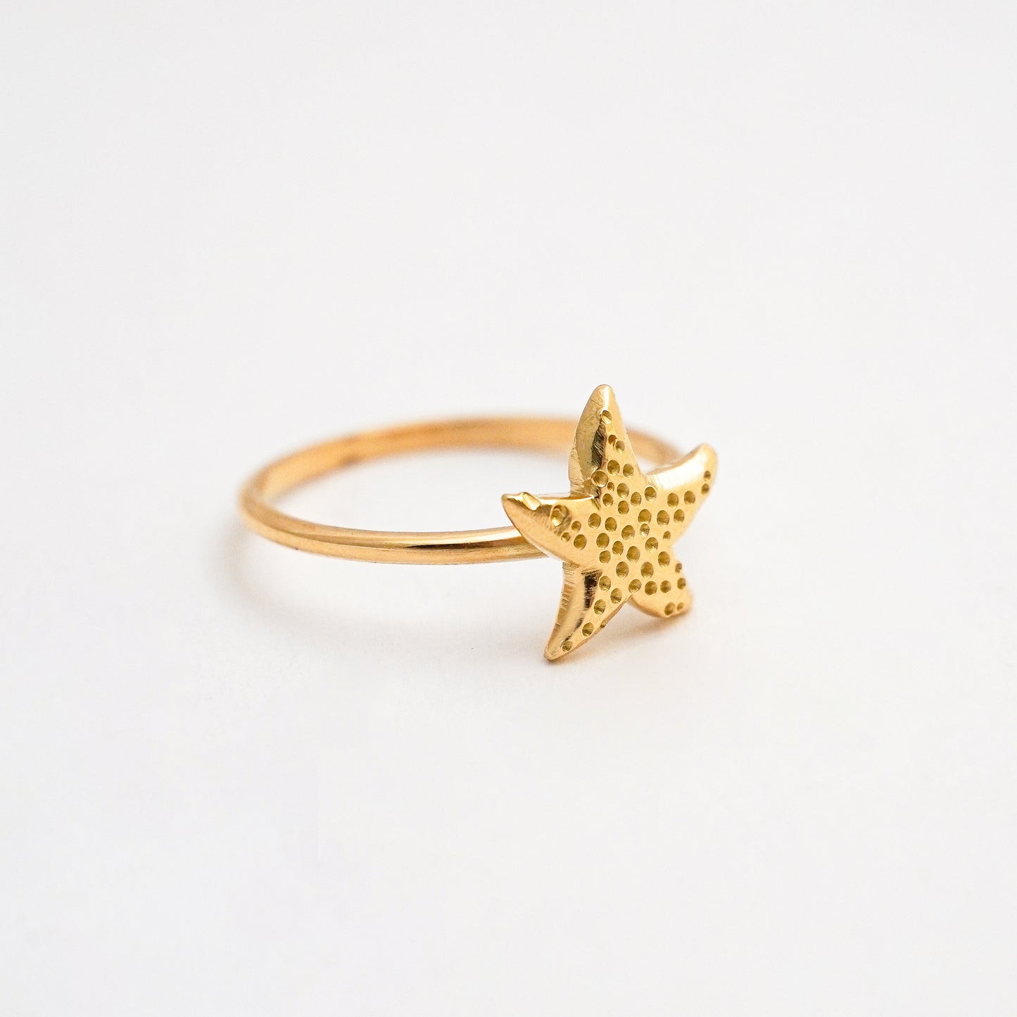 Anillo estrella de mar en Oro18k