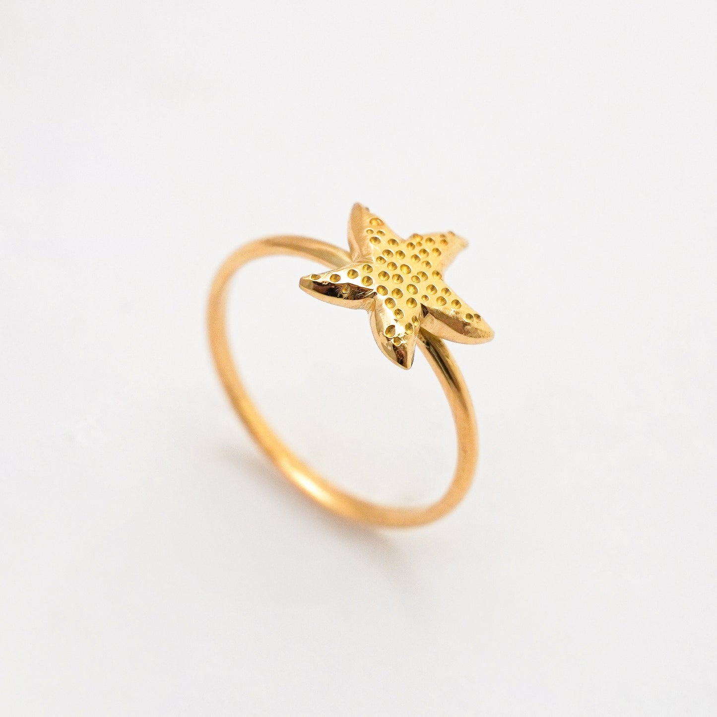 Anillo estrella de mar en Oro18k