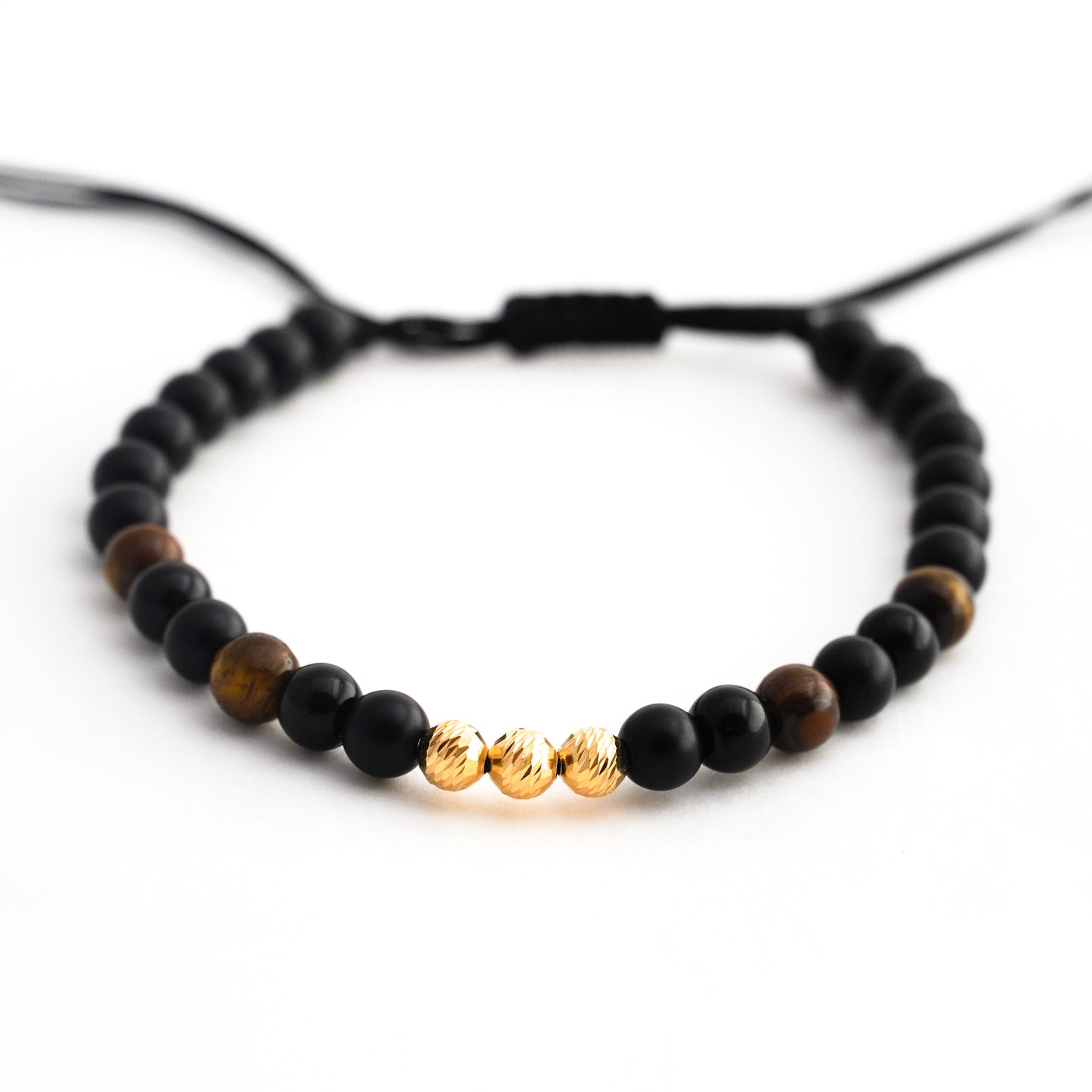 Pulsera tejida ónix y ojo de tigre con bolitas diamantadas 5mm en Oro18k