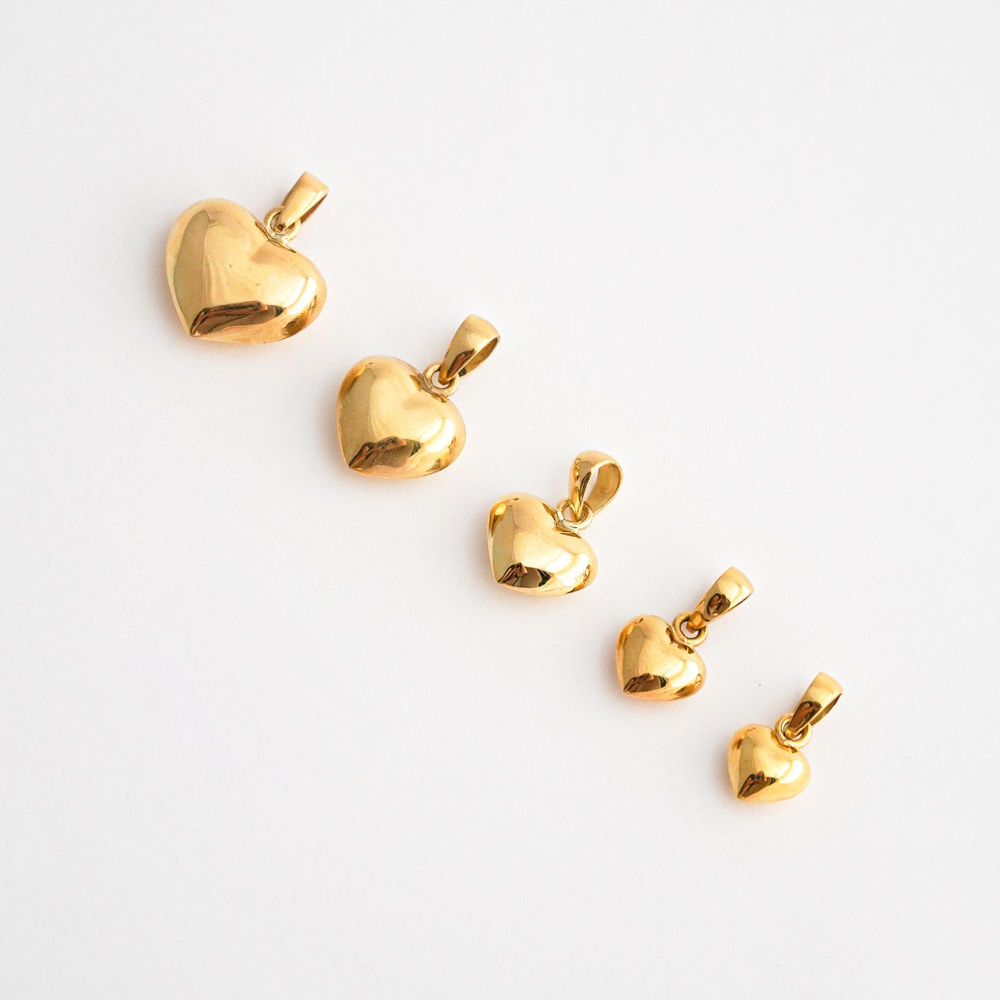 Dije Corazón Bombé Oro 18K