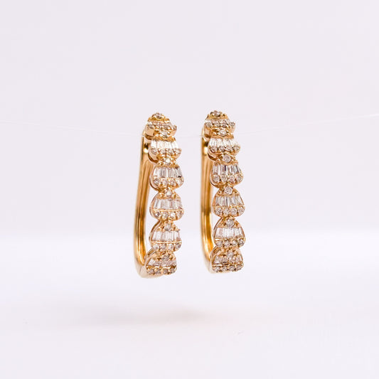 Argollas love baguettes con diamantes en oro 18k