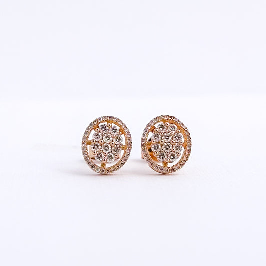 Aretes Halo Oval con diamantes en oro 18k