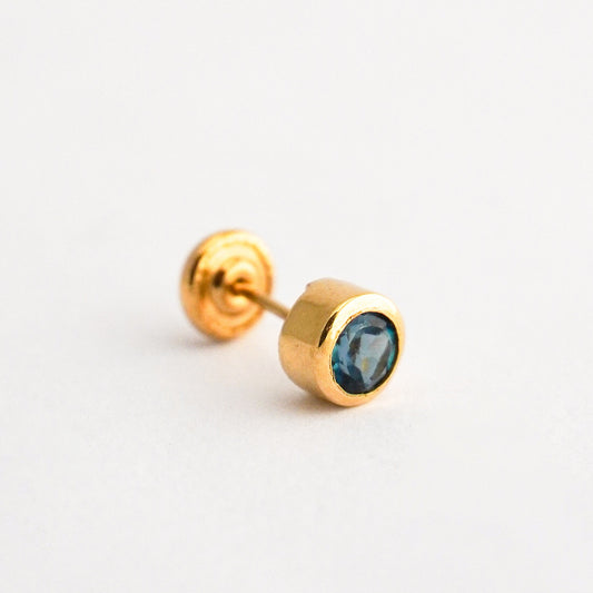 1/2 Arete de bebé en Oro18k con piedra natural topacio london blue Oro18k
