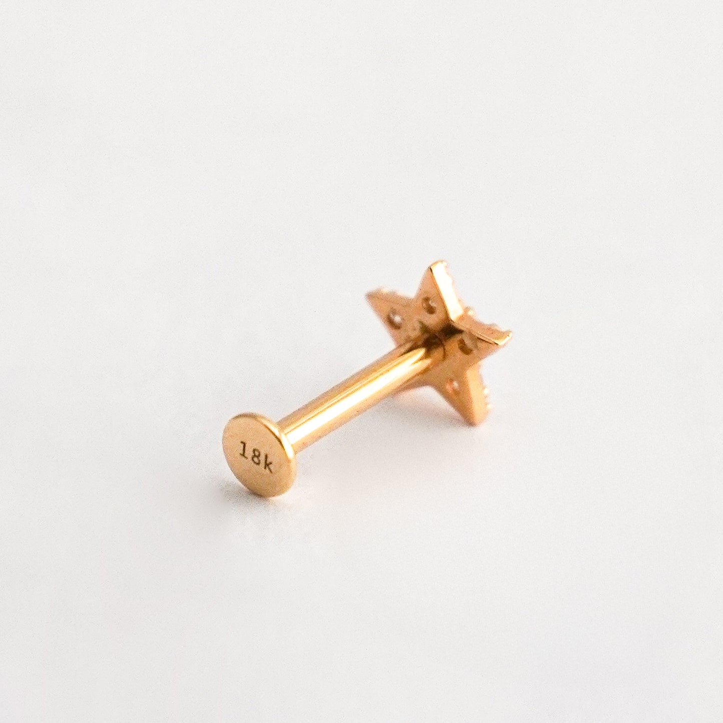 Piercing estrella en Oro18k con diamantes naturales