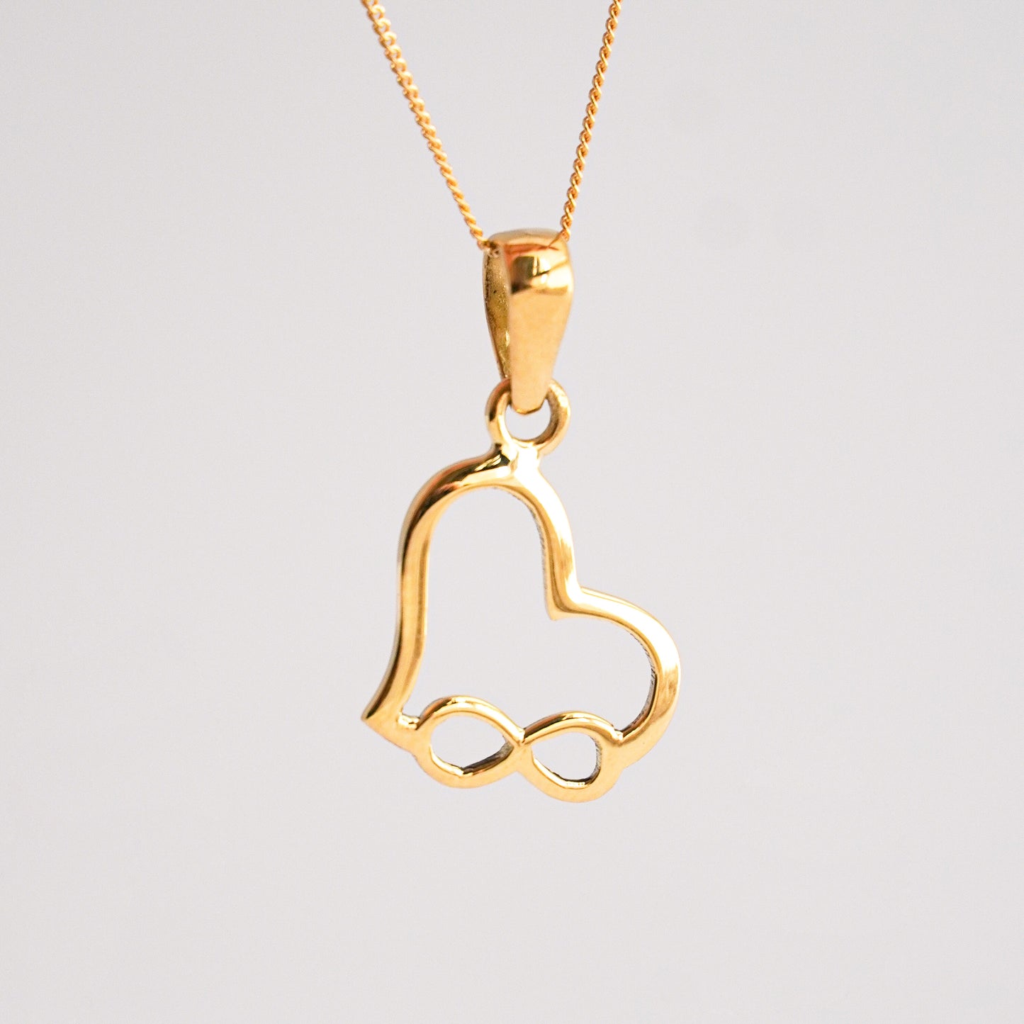 Dije Corazón infinito Oro18k