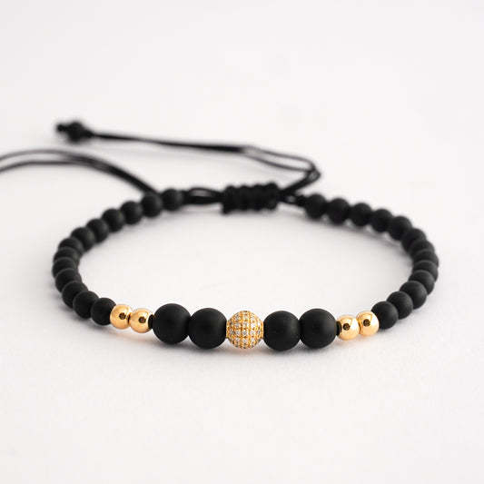 Pulsera ónix esfera con diamantes en Oro18k