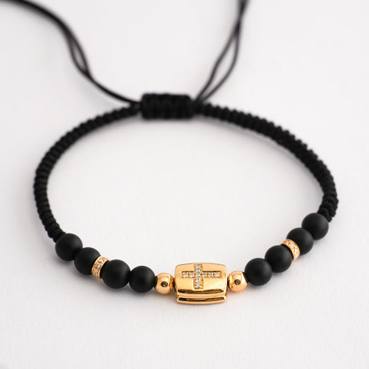 Pulsera ónix cruz con diamantes en Oro18k