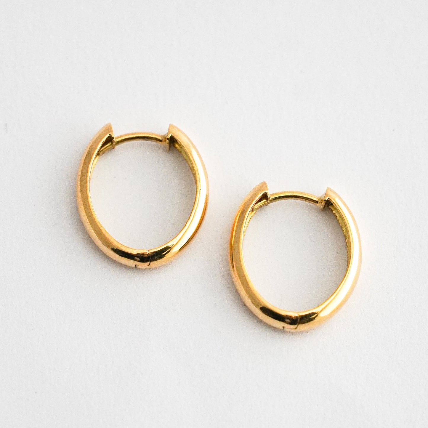 Argollas oval media caña oro 18k