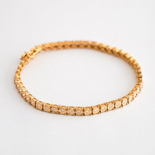Tenis star setting con diamantes 0.764 cts en oro 18k