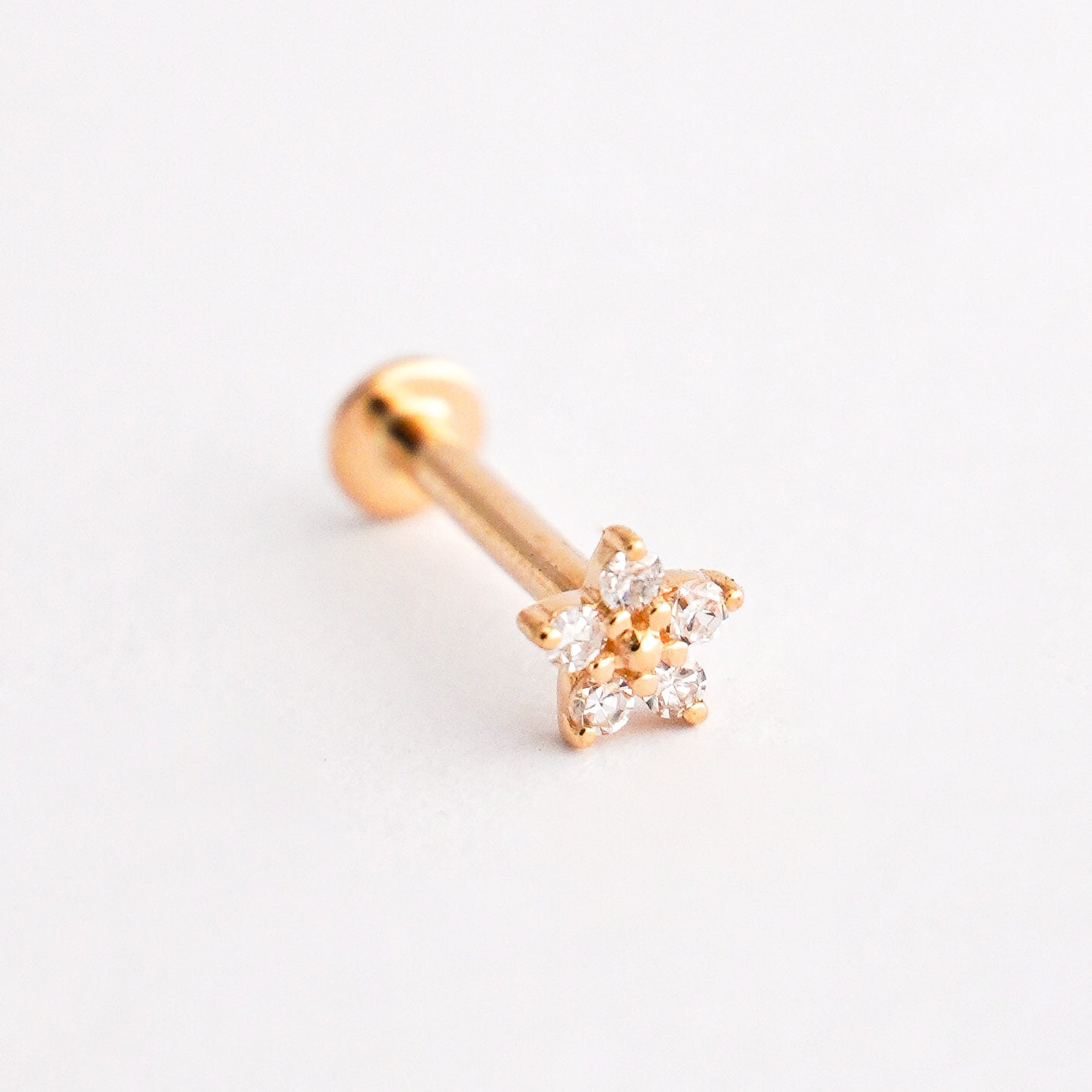 Piercing mini flor en Oro18k con diamantes naturales