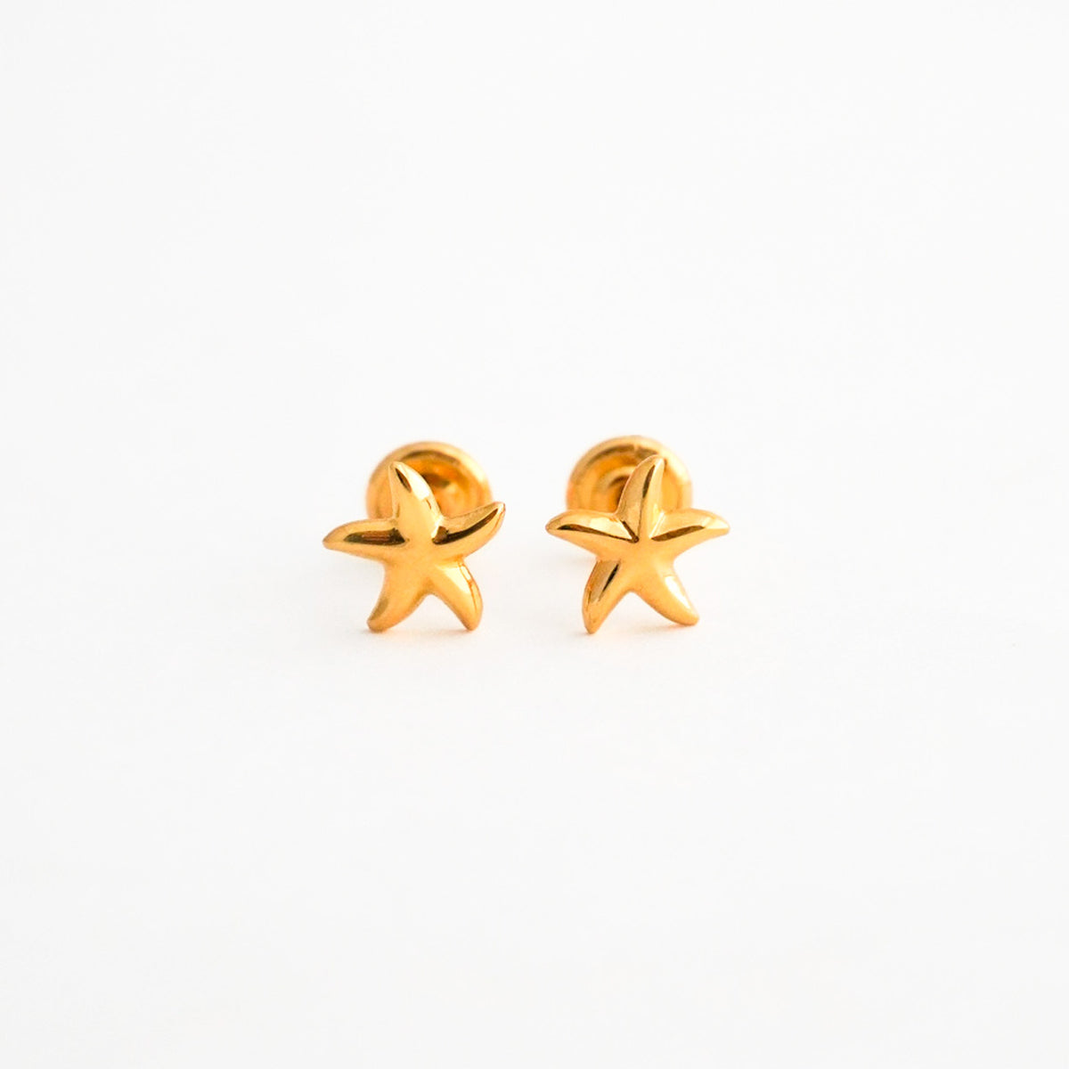 Arete Bebé de Estrella de Mar en Oro 18K