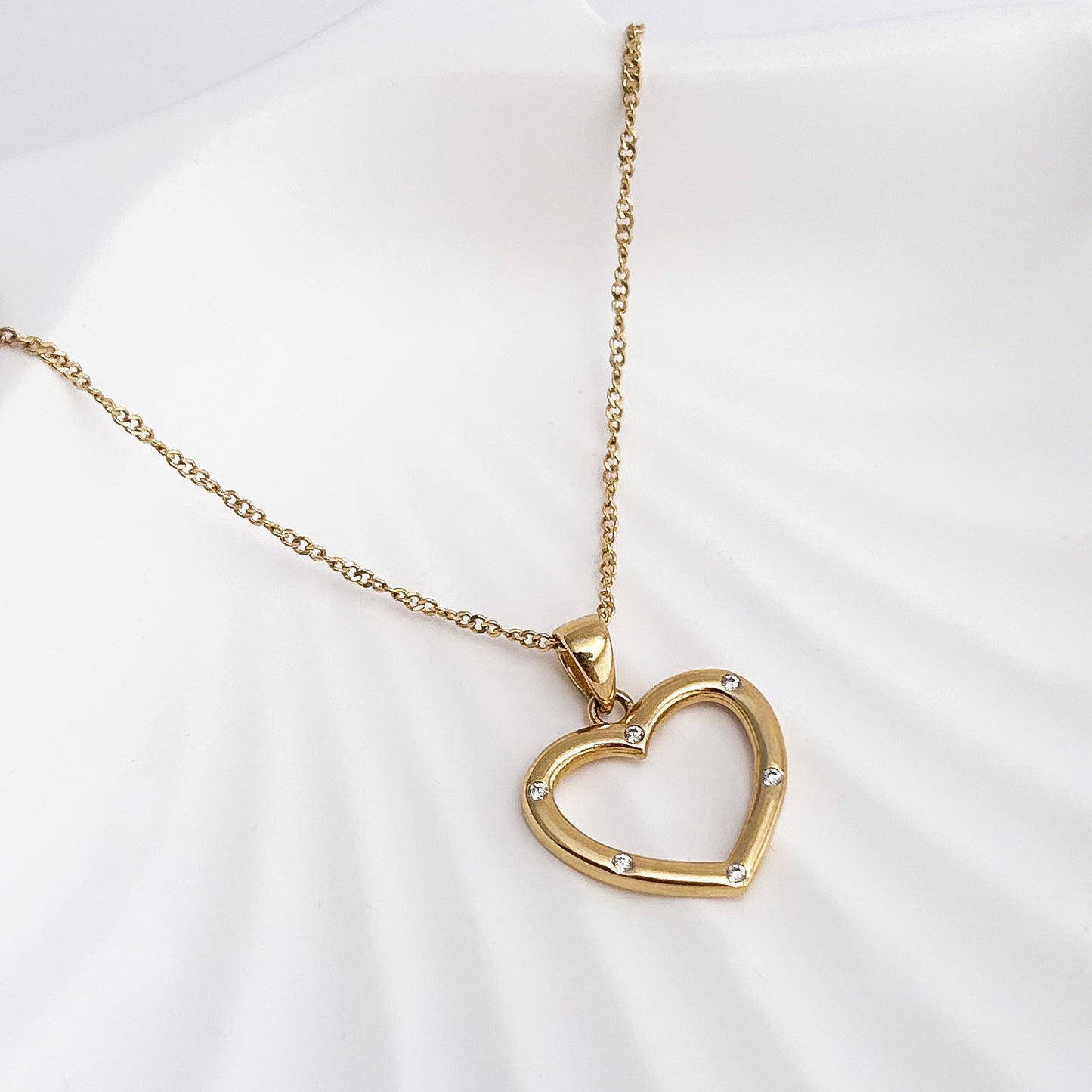 Dije corazón de Luz Oro 18k