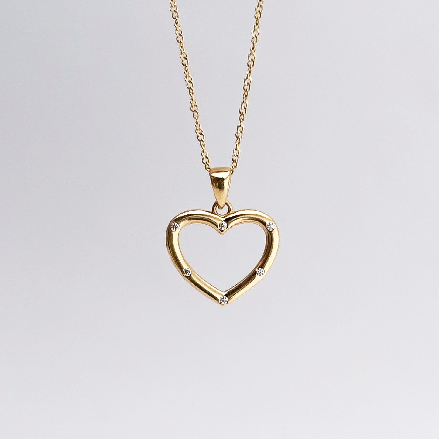 Dije corazón de Luz Oro 18k